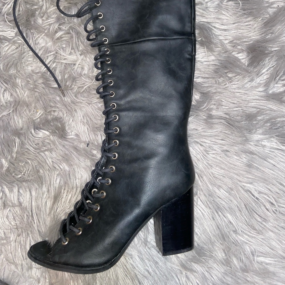 Black laced up boots